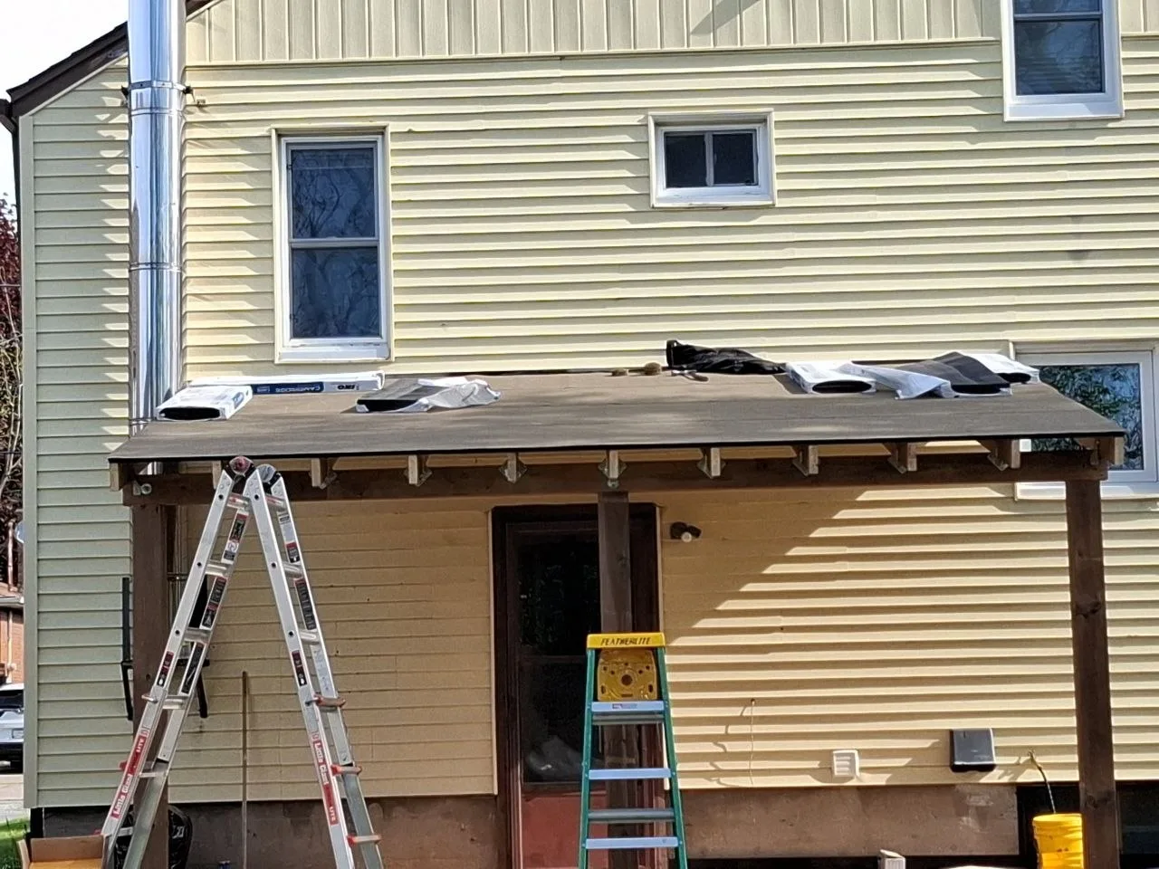 Back deck rebuild in Niagara Falls — decking and finish